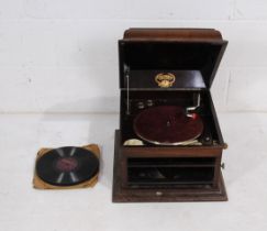 An antique Columbia 'Grafanola' gramophone, with a small quantity of shellac 78rpm records