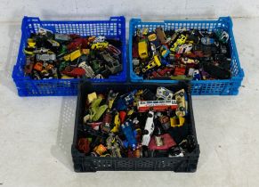 Three small crates of playworn die-cast vehicles including Corgi, Dinky, Lesney, Matchbox, Hotwheels