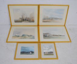 A collection of six framed landscape watercolours signed 'Wade' - largest measuring 40.5cm x 50cm