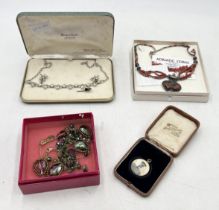 A boxed Van Dell necklace and earring set, A Butler & Wilson necklace, yellow metal photo pendant