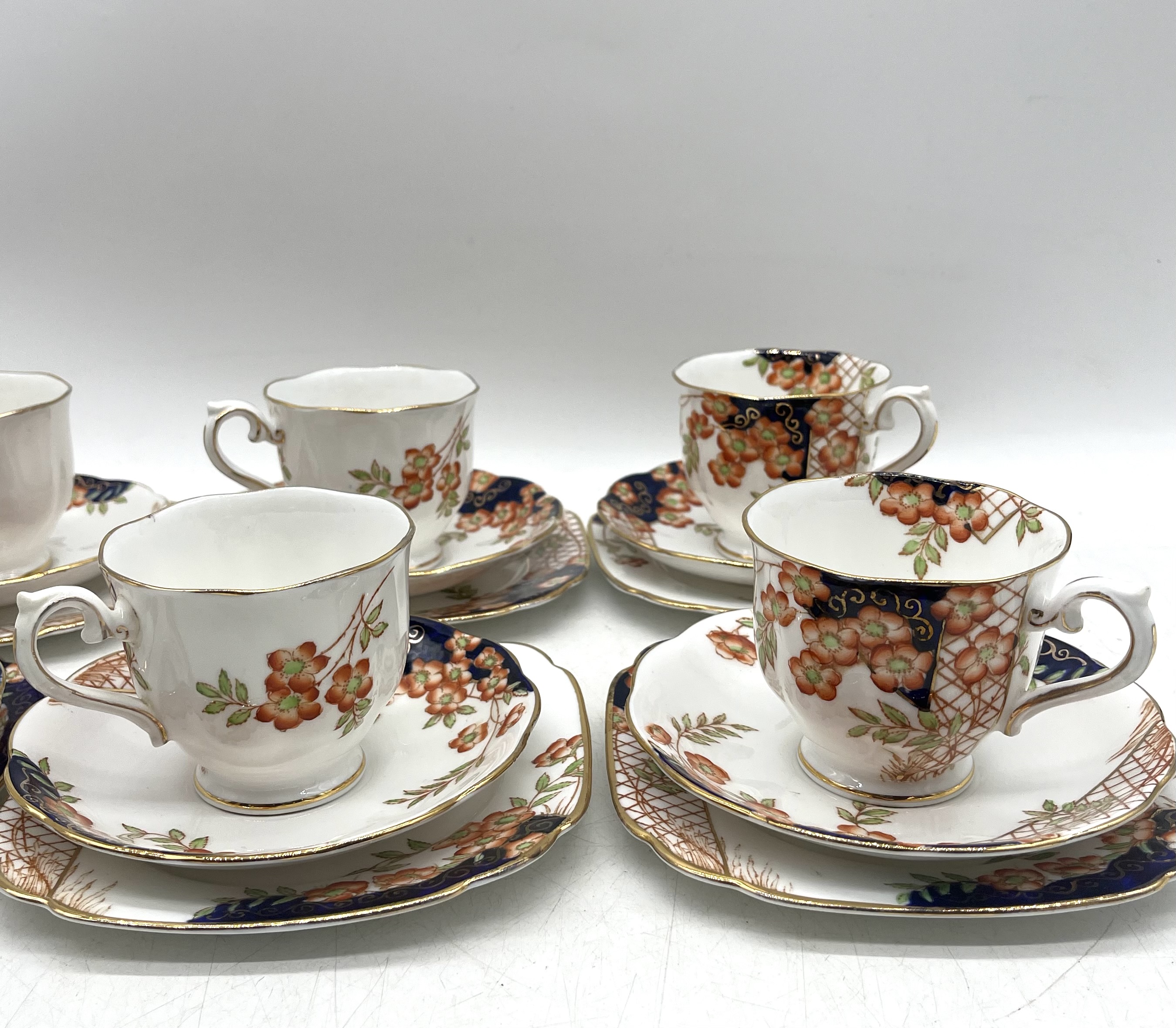 A Royal Albert Crown China tea set pattern 938015 including one sandwich plate, six trios, a milk - Image 6 of 12