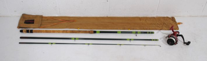 An 11ft three piece fly fishing rod, with case, along with a Shakespeare Firebird 070 fishing reel