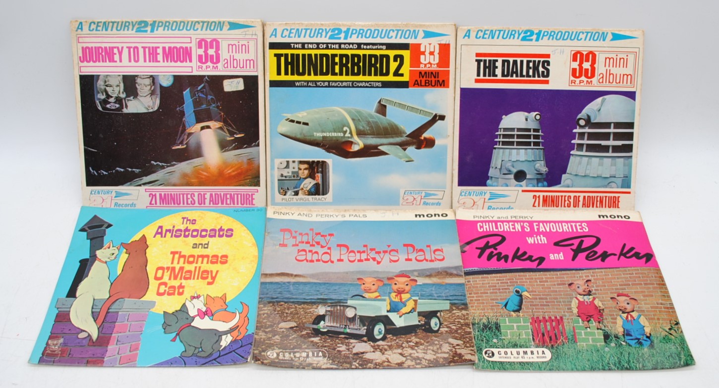 A collection of six children's 7" vinyl records, including 'The Daleks', 'Thunderbird 2', 'Journey