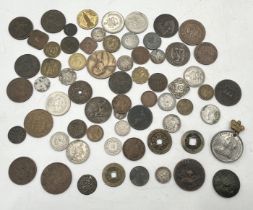 A collection of worldwide coinage etc. including China, East Africa & Uganda, Australian Victoria