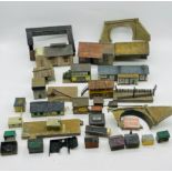 A collection of model railway accessories including buildings (some A/F), power units, trees,