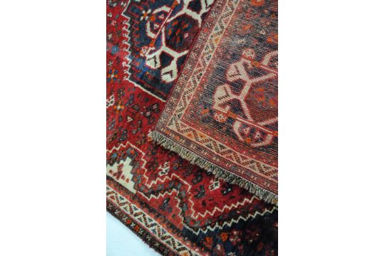 An Eastern red ground rug, with traditional designs - 173cm x 123cm - Image 7 of 8