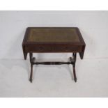 A reproduction Georgian style mahogany drop-leaf coffee table, with green leather inset top and