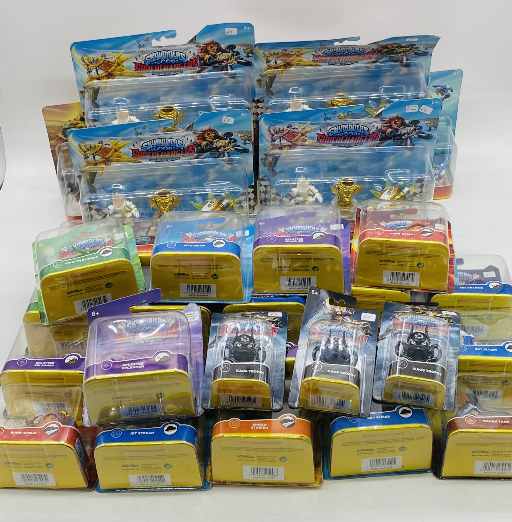 A collection of Skylanders SuperChargers vehicles by Activision including triple action packs, Sky
