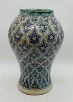 A large pottery Islamic vase - height 40cm