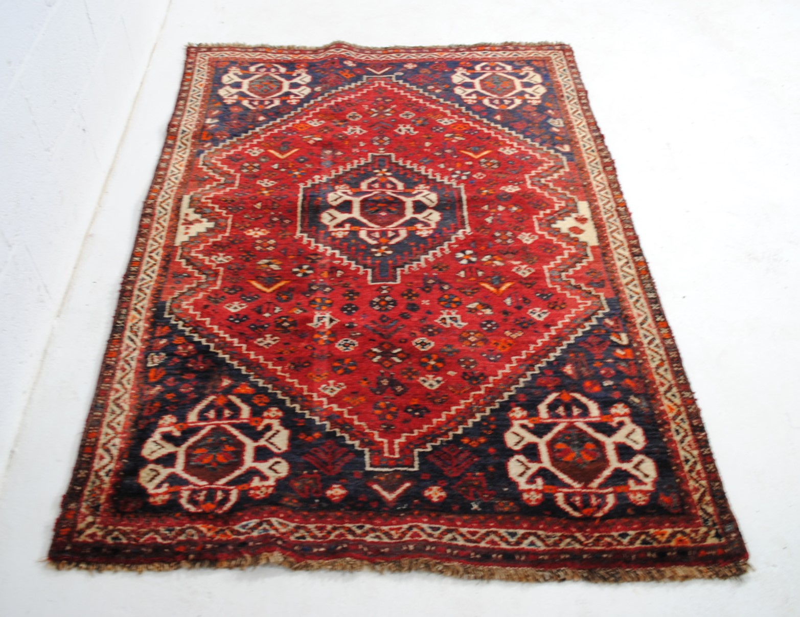 An Eastern red ground rug, with traditional designs - 173cm x 123cm - Image 4 of 8