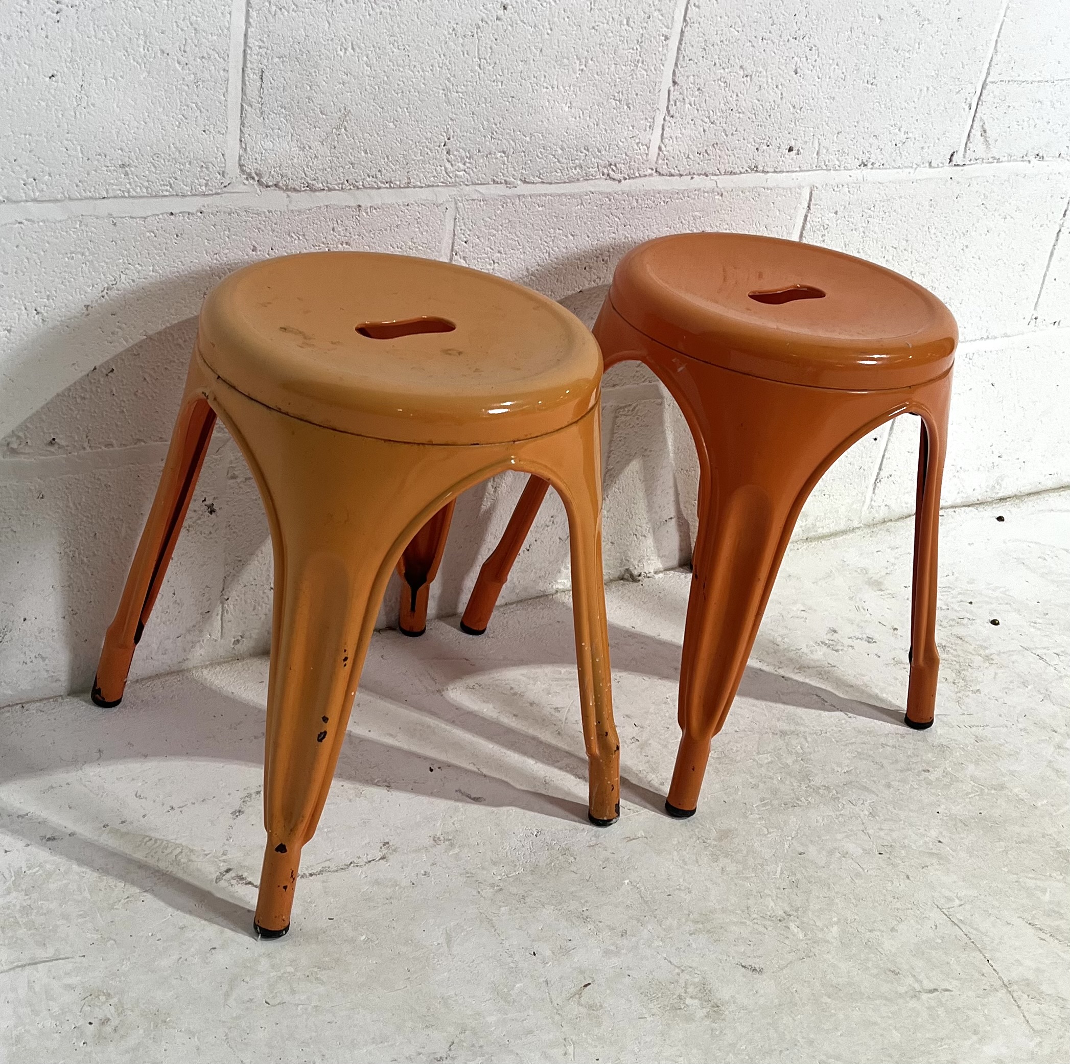 A near pair of retro style bistro metal stools, height 45cm.