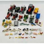 A collection of various farm related toys including several tractors (Siku, Matchbox etc),