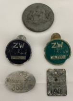 A small collection of WWII German badges etc. including various workers tags/lapel badges etc