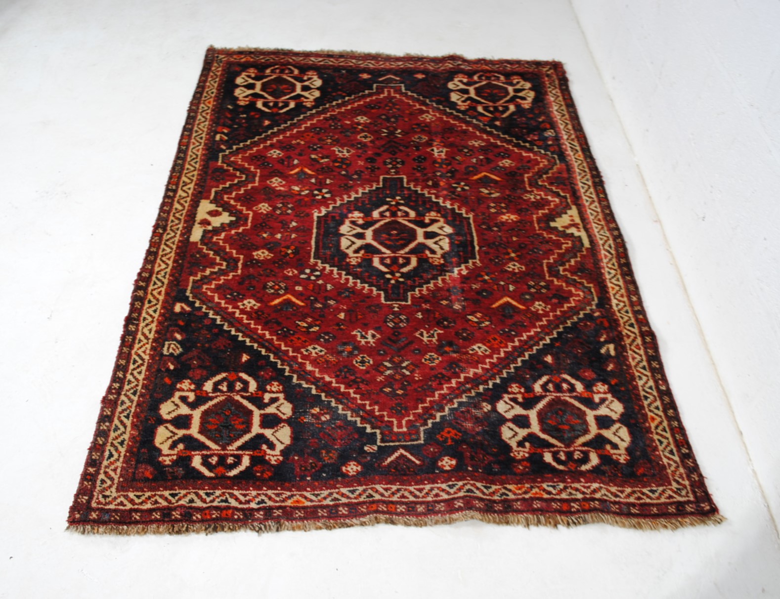 An Eastern red ground rug, with traditional designs - 173cm x 123cm - Image 3 of 8