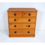 A Victorian pine chest of five drawers, with turned handles and key - length 93cm, depth 45cm,