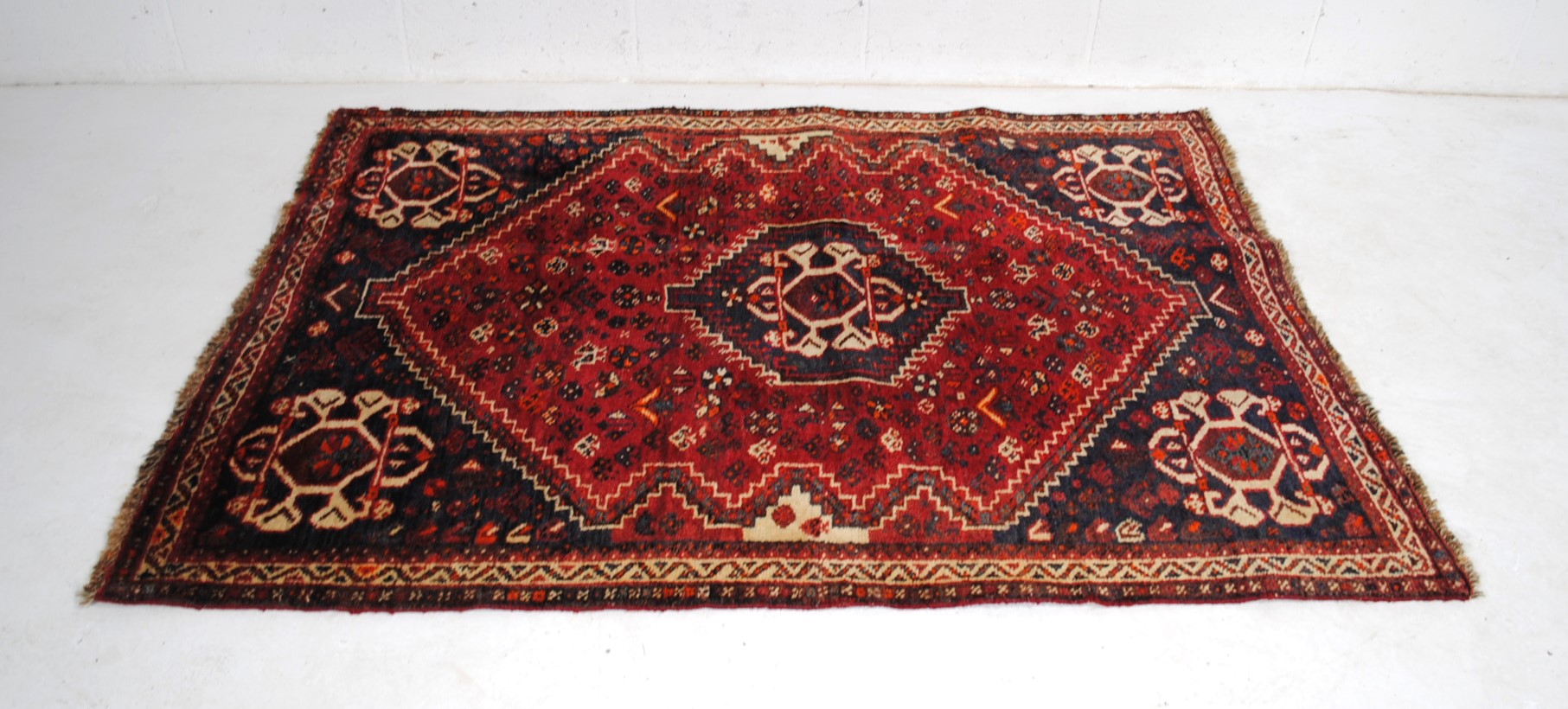 An Eastern red ground rug, with traditional designs - 173cm x 123cm - Image 2 of 8