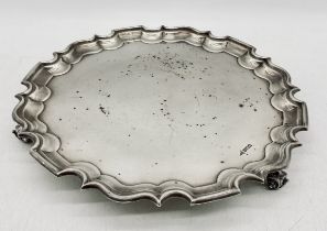A hallmarked silver salver by Mappin & Webb, dated 1910, weight 860g (27.64 troy ounces)