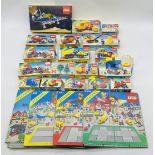 A collection of boxed 1980's Lego Legoland sets, mainly vehicles including Pneumatic Crane (6678),