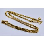 A 15ct gold necklace with safety chain, total weight 9.2g