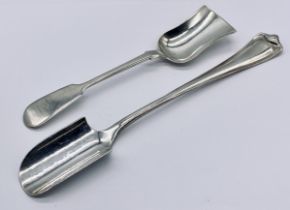 An Exeter silver stilton scoop dated 1851 by John Stone along with another silver stilton scoop by