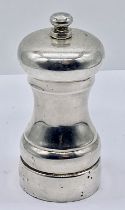 A hallmarked silver pepper grinder