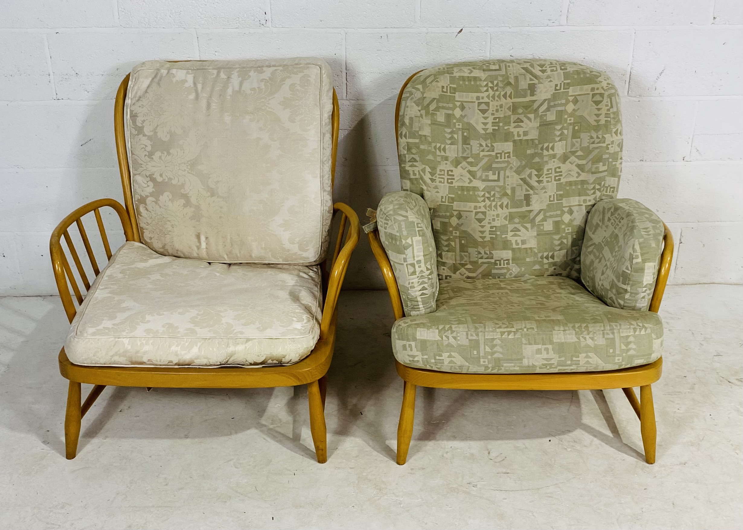 A pair of Ercol blonde armchairs