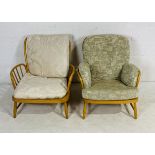 A pair of Ercol blonde armchairs