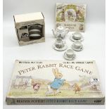 A Wedgwood Beatrix Potter children's tea set, along with another similar tea set and Beatrix