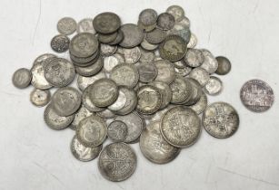 A collection of pre 1947 silver coinage along with .999 silver token from the 1972 Munich Olympics