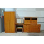 A mid-century Meredew oak bedroom suite, comprising a single wardrobe, a dressing table with three