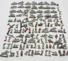 A collection of metal/lead toy figurines including soldiers, cyclist, horse etc - some A/F