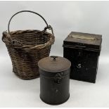 A metal ballot box with sliding cover along with a wicker basket with handle and one other