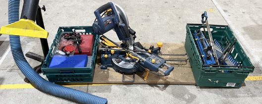 A collection of various tools including a Ryobi mitre saw (EMS-2025SCL)
