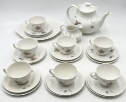 A Royal Doulton tea service in the Tumbling Leaves pattern