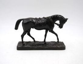 A bronze figure of a horse stamped 11677 to base - length 15.5cm, height 10cm