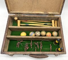 A vintage table top croquet set