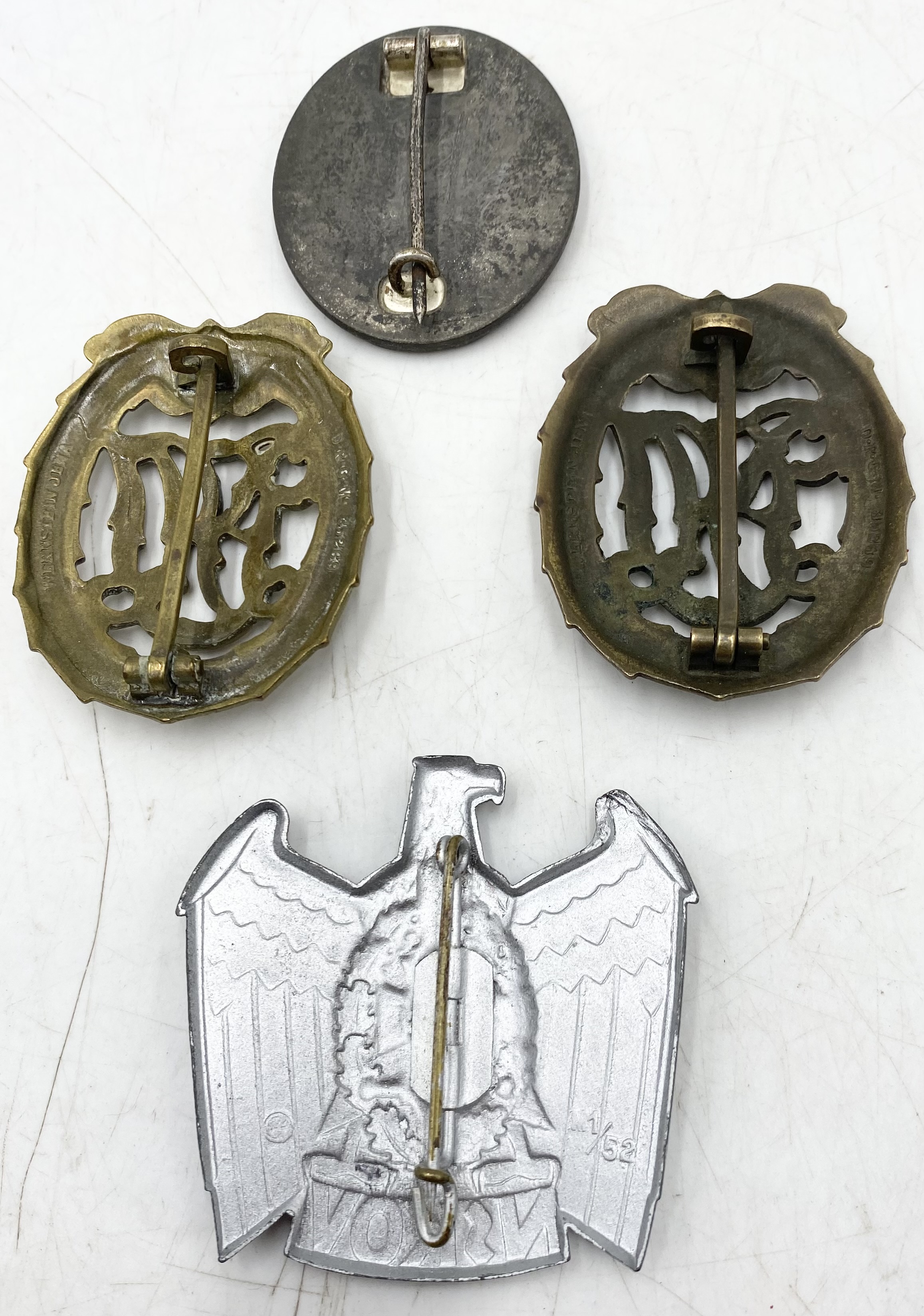 A German WWII wound badge marked to reverse 107, two DRL sports badges along with an NSKOV cap - Image 5 of 5