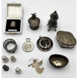 A collection of hallmarked silver items including a Victorian lidded box, shell shaped salt with