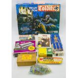 A collection of various toys and games including chess, marbles, Waddington's poker, Escape from