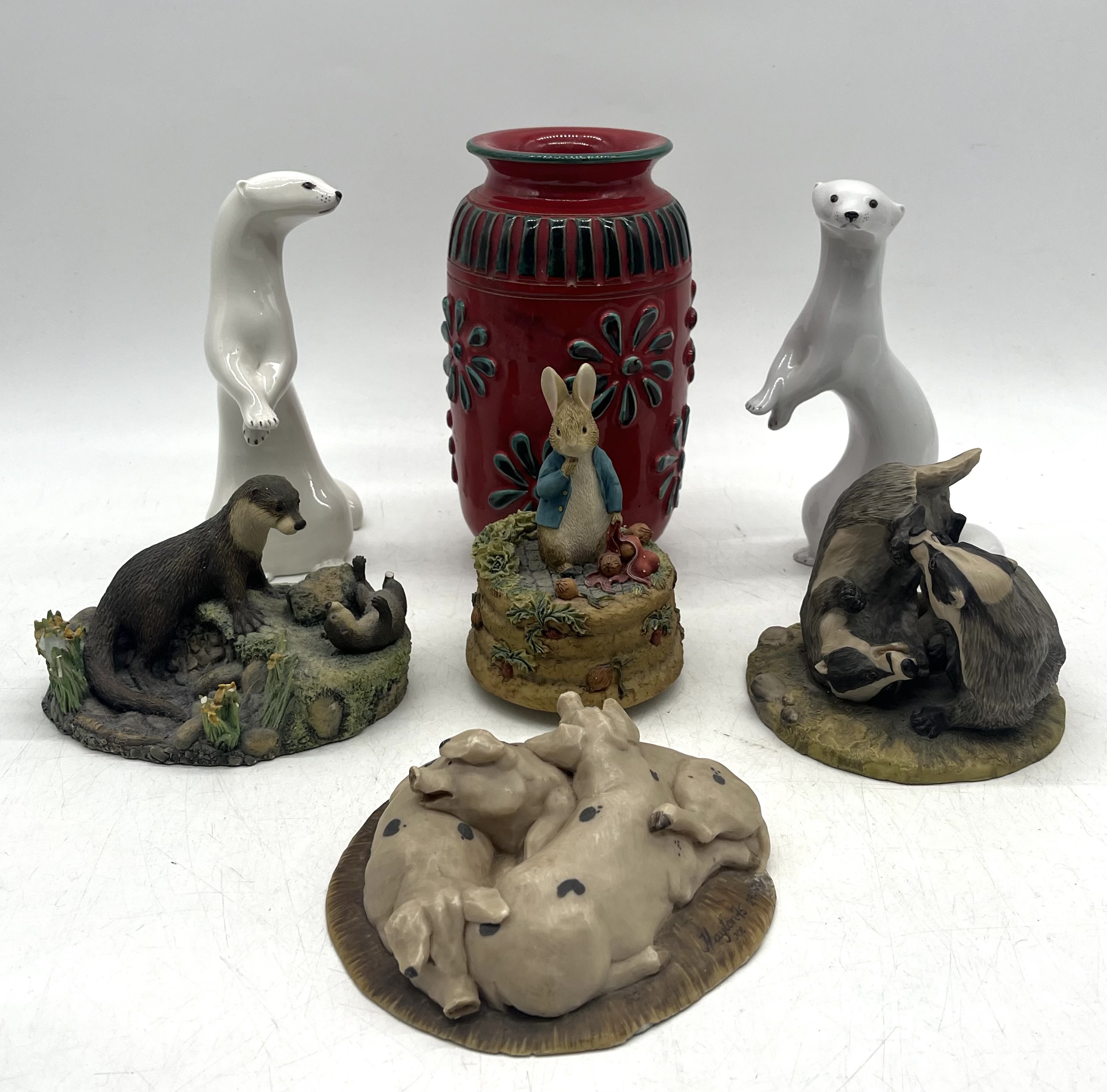 An assortment of animal figurines including two vintage Russian (U.S.S.R), three Border Fine Arts (