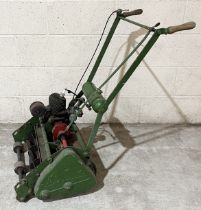A vintage petrol powered lawnmower