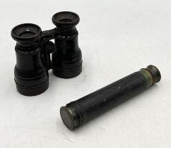 An antique miniature two drawer telescope along with an antique pair of binoculars