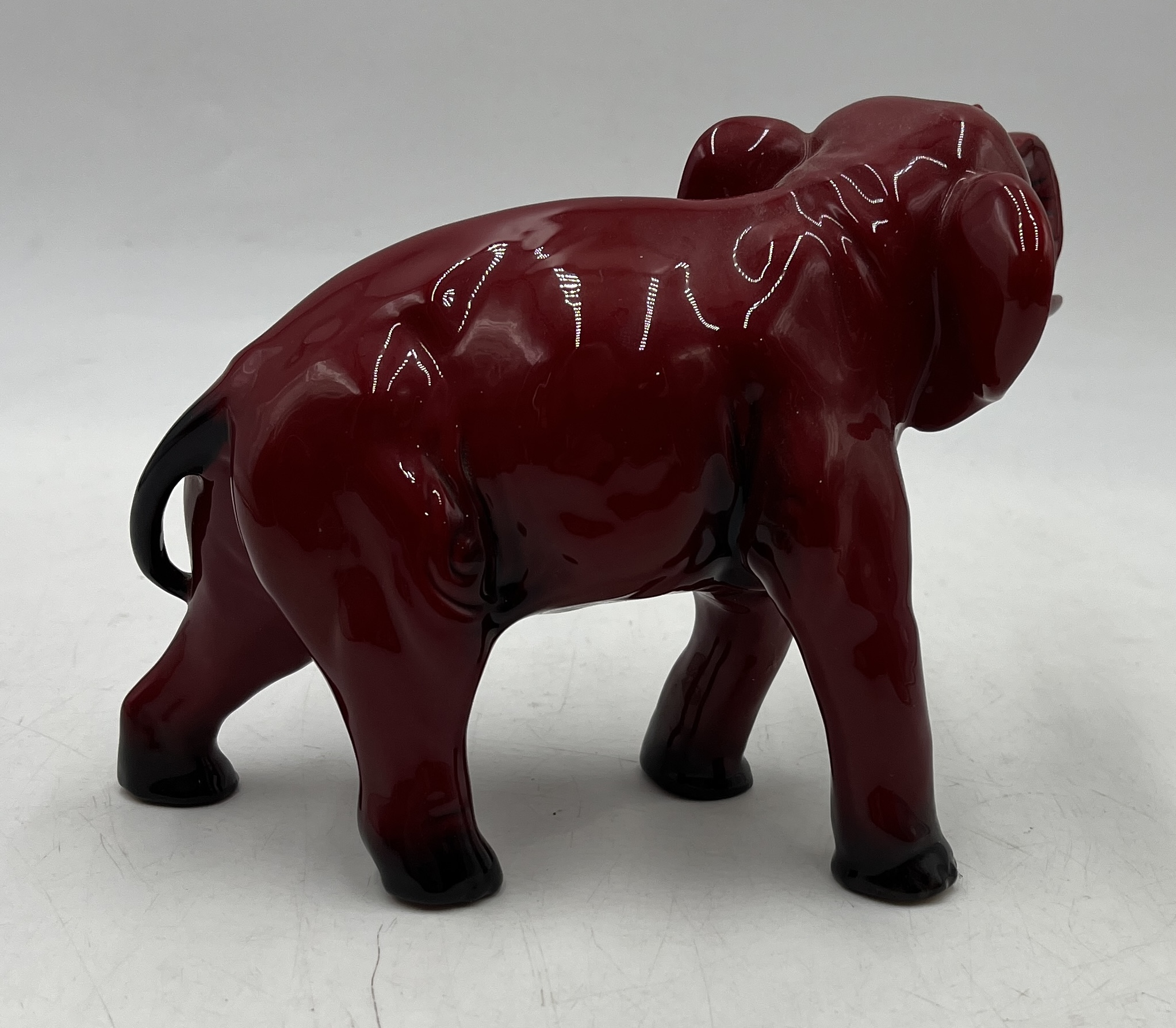 A Royal Doulton Flambe elephant with raised trunk signed by Michael Doulton in gold to the base - Image 3 of 4