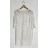 A vintage 1960's Emenson lace/crochet short length wedding dress