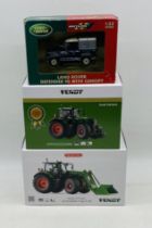 Two boxed Wiking Fendt die-cast tractors including Fendt 724 Vario and 728 Vario, along with boxed