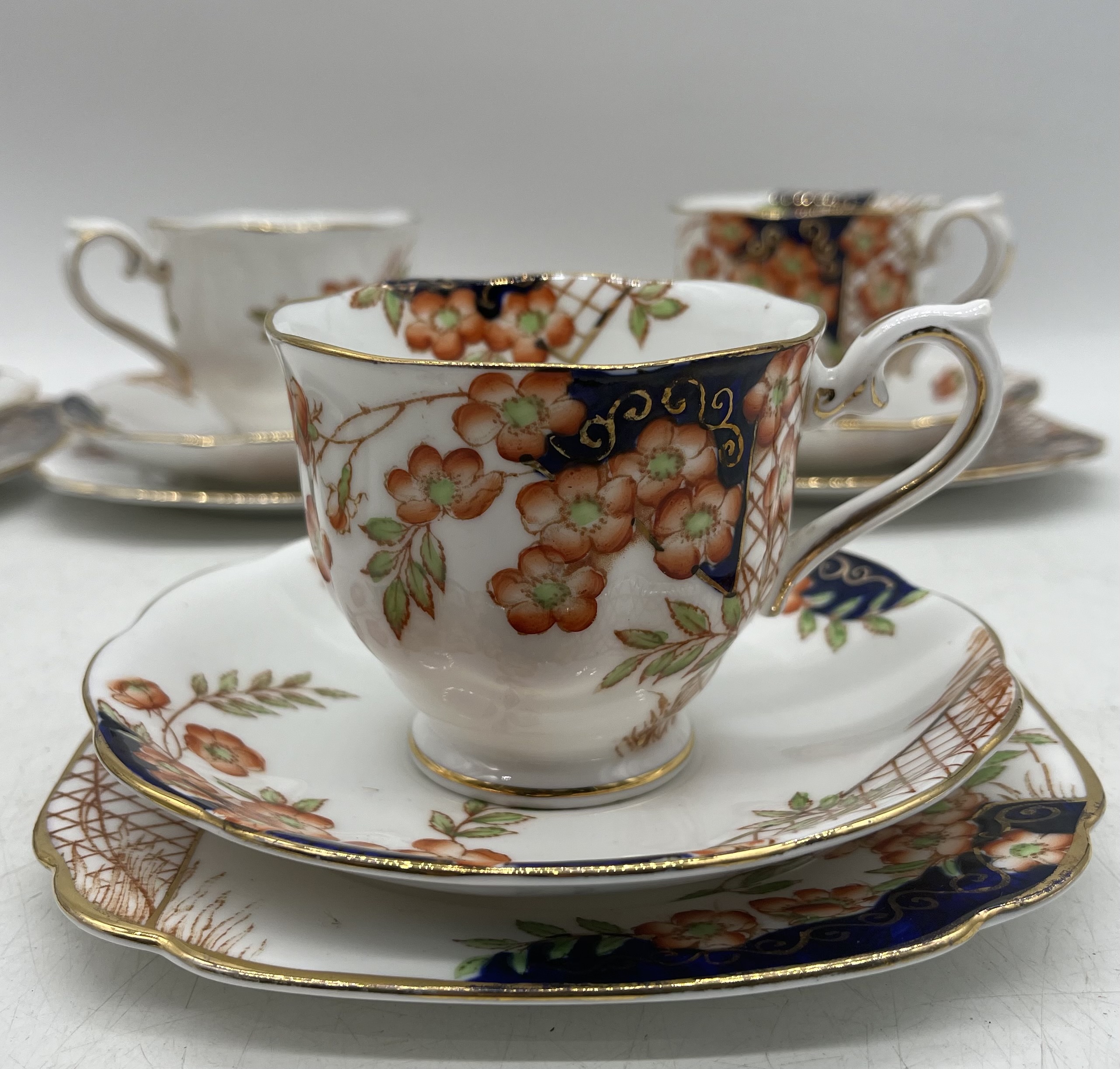 A Royal Albert Crown China tea set pattern 938015 including one sandwich plate, six trios, a milk - Image 5 of 12