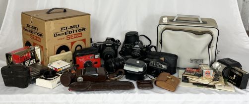 A collection of vintage cameras and camera equipment including Konica Pop, Pentax, Eumig etc.