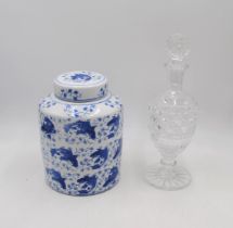 A 20th Century Chinese blue and white ceramic jar and cover, along with a cut glass decanter with