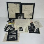 Two framed sketches of nudes along with a portfolio of sketches, photography, paintings and mixed
