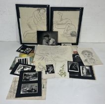 Two framed sketches of nudes along with a portfolio of sketches, photography, paintings and mixed